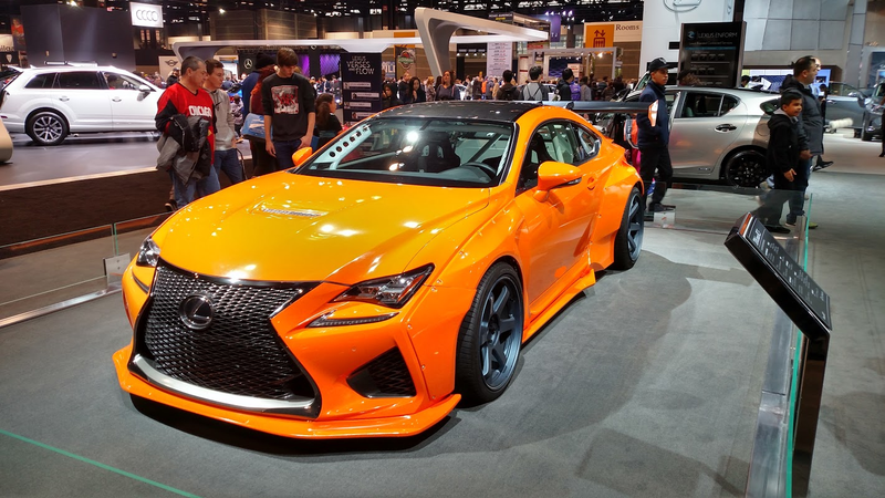 A very orange widebody Lexus.